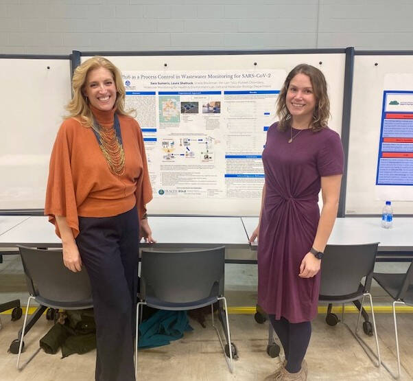 Sara and Laura presenting poster